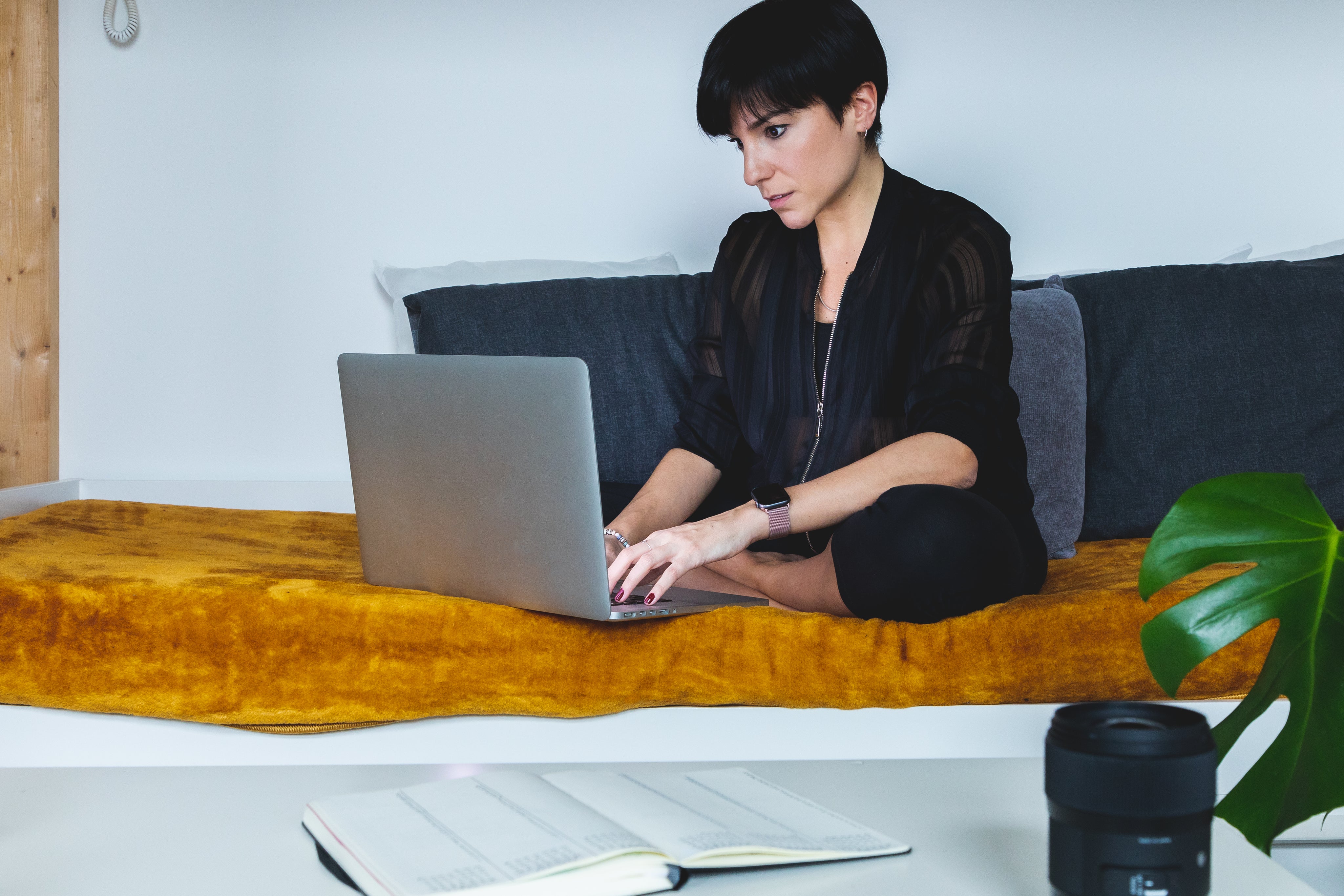 files/person-sits-crossed-legged-working-on-their-laptop.jpg